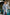 ELAGIA sky-blue long sleeve midi dress lifestyle shot showing purple business suit women office style