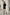 ELAGIA Julie Black Belted Mini Dress styled on model - 3 piece women's suit design elements in mini dress format