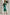 ELAGIA emerald long sleeve midi dress lifestyle shot - 3 piece women's suit look for modern businesswoman