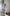 ELAGIA Silver Satin Long Sleeve Mini Dress - accessorized styling with 3 piece women's suit vibe