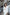 ELAGIA Alexa White Skirt Suit 2-Piece close-up of blazer details with 3 piece women's suit sophistication