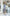 ELAGIA graphite puff sleeve wrap dress - side angle showing purple business suit women's wrap style design