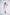 ELAGIA 3 piece women's suit pink ensemble - lifestyle shot with model posing in complete look