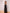 ELAGIA Black Strapless V-Neck Jumpsuit detail shot of neckline - sophisticated women's black suit set styling