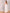 ELAGIA white strapless v-neck jumpsuit fabric texture detail - womens white suit material and construction view