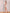 ELAGIA gold one-shoulder satin mini dress side angle view displaying body-hugging silhouette