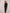 ELAGIA black silk belted midi dress close-up fabric texture detail for 3 piece women's suit aesthetic