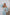 ELAGIA tiffany-blue puffed sleeve midi prom dress - back view detail with purple business suit women styling elements
