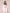 ELAGIA white regular-fit 3 piece women's suit lifestyle shot showing versatile professional styling