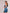 ELAGIA blue one-shoulder satin mini dress lifestyle shot on model - 3 piece women's suit styling