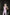 ELAGIA pink suit sleeveless jumpsuit side profile view highlighting waist definition
