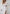 ELAGIA Alexa White Skirt Suit 2-Piece close-up of skirt hemline and professional 3 piece women's suit cut