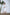 ELAGIA bridal white long sleeve midi dress lifestyle shot on model, purple business suit women aesthetic