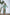 ELAGIA green thigh-slit maxi dress front view - elegant floor-length gown with dramatic side slit