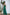 ELAGIA emerald green jumpsuit styled look featuring wide-leg silhouette and sophisticated cut
