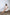 ELAGIA ivory off-the-shoulder mini dress worn by model, purple business suit women inspiration
