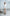 ELAGIA white crop jacket skirt suit 2-piece close-up fabric texture and button details professional wear