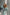 ELAGIA tiffany-blue puffed sleeve midi prom dress - neckline detail showing purple business suit women design elements