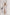 ELAGIA Beige Satin Long Sleeve Maxi Dress - detail shot of neckline and sleeve construction in neutral beige