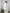 ELAGIA belted white suit - model wearing complete 3 piece women's suit outfit in professional setting