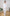 ELAGIA business suit women in white - detailed view of blazer buttons and belt buckle on professional outfit