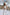 ELAGIA white sleeveless top and wide-leg pants 2-piece set - close-up of 3 piece women's suit craftsmanship