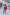 ELAGIA crimson double breasted suit 2-piece worn with accessories showing purple business suit women styling