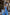 Full outfit view ELAGIA sky-blue 2-piece set with bow top and wide-leg pants for professional wear