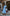 ELAGIA sky-blue puff-sleeve wrap midi dress front view in soft blue shade - 3 piece women's suit alternative