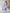 ELAGIA lavender satin puff-sleeve midi dress waist detail showing purple business suit women's structure