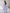 ELAGIA lavender satin puff-sleeve midi dress fabric close-up with 3 piece women's suit texture