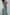 ELAGIA mint polka-dot bow top & midi skirt 2-piece set side angle - retro 3 piece women's suit inspired look