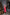 ELAGIA Red Sweetheart Corseted Midi Dress close-up of 3 piece women's suit style sweetheart neckline