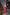 ELAGIA Red Sweetheart Corseted Midi Dress detail view of purple business suit women inspired corseted waist