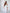 ELAGIA white satin puff-sleeve midi dress sleeve detail highlighting 3 piece women's suit design elements