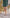 ELAGIA emerald silk long sleeve ruched mini dress - side angle detail view, 3 piece women's suit alternative