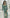ELAGIA Emerald Satin Long Sleeve Maxi Dress front view - elegant floor-length gown in rich emerald green