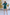 ELAGIA Emerald Silk Long Sleeve Ruched Mini Dress - close-up of long sleeve design, 3 piece women's suit inspired