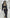 ELAGIA black long sleeve top and maxi skirt 2-piece set - side angle showing flowing maxi length