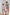 ELAGIA beige polka dot linen outfit - side angle detail of casual womens red suit set coordination