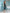 ELAGIA Green Satin Corseted Strapless Dress - lifestyle shot of 3 piece women's suit inspired evening wear