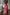 ELAGIA coral business suit - lifestyle view of complete 3 piece women's suit worn for professional occasions