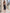 ELAGIA Black Backless Halter Midi Dress - detail of halter neckline and draping, 3 piece women's suit appeal