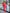 ELAGIA red 2-piece suit styled for office setting - modern 3 piece women's suit alternative in workspace