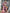 ELAGIA purple business suit women close-up detail of puff sleeves on 3 piece women's suit wrap dress