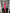ELAGIA crimson one-shoulder tulip midi dress detail shot of tulip hemline - 3 piece women's suit aesthetic