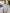 ELAGIA sky-blue one-shoulder satin mini dress - full body styled shot for party or formal event