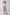ELAGIA beige square neck backless midi dress back view showing open back design - 3 piece women's suit style