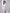 ELAGIA Ivory Square Neck Backless Midi Dress - three-quarter view showcasing midi length and fit