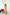 ELAGIA beige off-shoulder maxi dress back view showing flowing silhouette - purple business suit women inspired